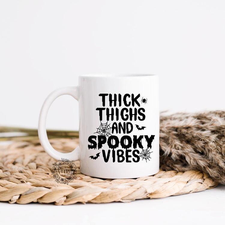 Thick Thighs And Spooky Vibes Coffee Mug